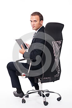 Young business man using a touch screen device