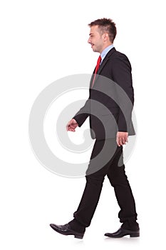 Young business man walking