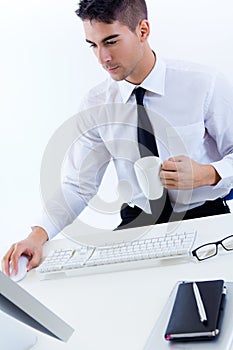 Young business man work in modern office on computer