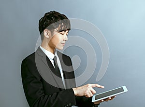 Young business man  working on digital tablet