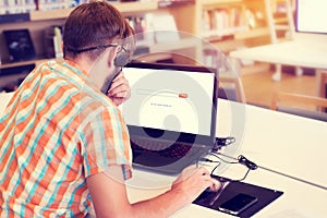 young business man working on his laptop.