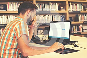 young business man working on his laptop.