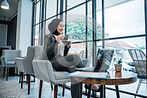 young business muslim woman working at her office