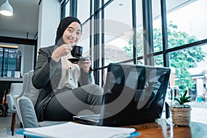 young business muslim woman working at her office