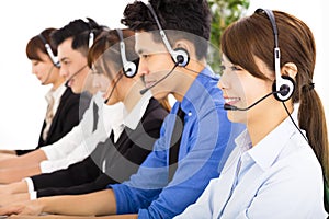 Young business people and colleagues working in call center