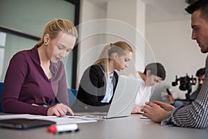 Young business people group on team meeting at modern office