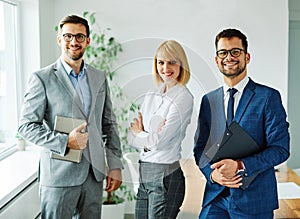 young business people meeting office teamwork corporate portrait beautiful businesswoman businessman colleague posing