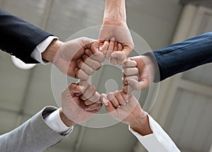 Young business people and office workers. Hand as a symbol