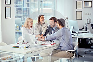 Young business people successfully completed business meeting photo