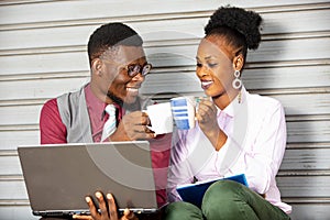 Young business people working with a laptop