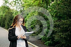 Young business professionals, gen z woman working, first job, interns, internship. Candid portrait Young business woman