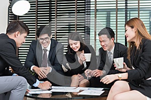 Young business professionals having a meeting in office.