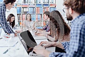 Young business team meeting in the office