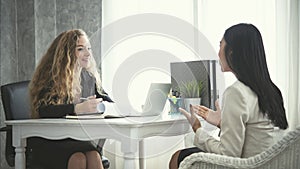 Young business woman applicant and human resources his conversation