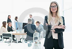 young business woman on the background of a modern office