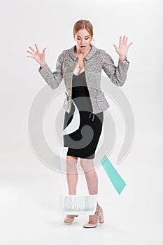 Young business woman blonde in black dress dropped folder of pap