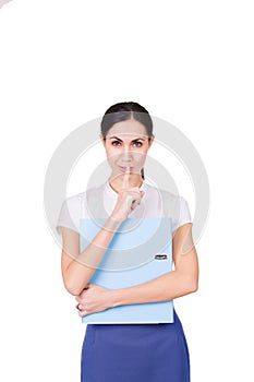 Young business woman in business clothes having a secret and making a hush gesture. Isolated