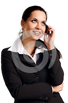 Young business woman calling by cellular phone.