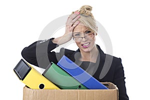 Young Business Woman Carrying a Box of Files