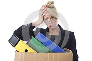 Young Business Woman Carrying a Box of Files