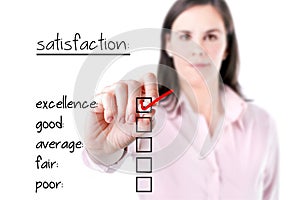 Young business woman checking excellence on customer satisfaction survey form.