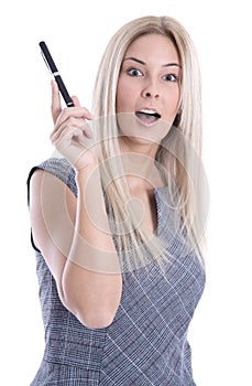 Young business woman in dress looking surprised holding pen isolated on white background