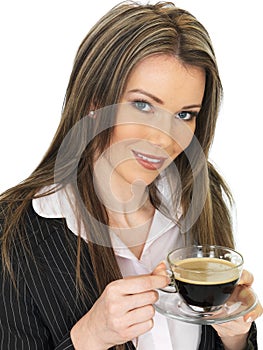Young Business Woman Drinking a Cup of Black Coffee