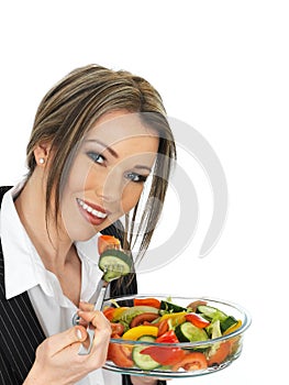 Young Business Woman Eating a Fresh Mixed Salad