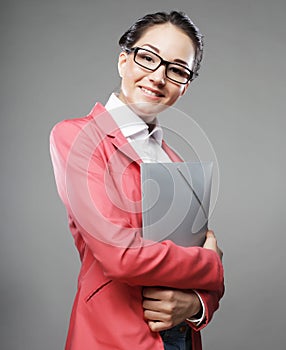 Young business woman with folders