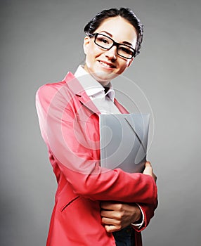 Young business woman with folders