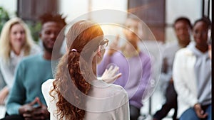 young business woman giving a presentation in a conference room.