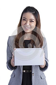 Young business woman happy smile hold gift box in hands