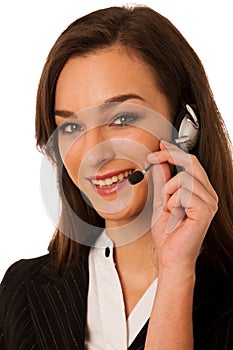 Young business woman with headset isolated over white background