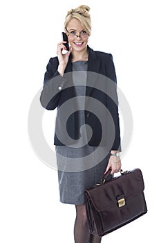 Young Business Woman Holding a Briefcase Talking on Mobile Cell Phone