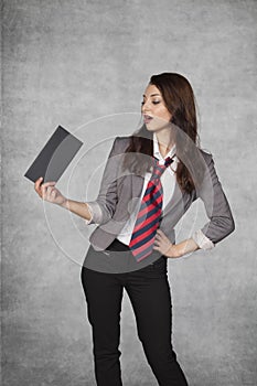 Young business woman holding an envelope with a bribe