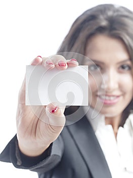 Young business woman holding visit card