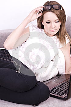 Young business woman with laptop