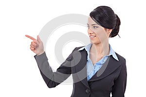 Young business woman looking and pointing