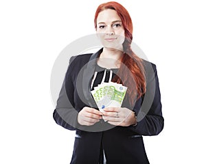 Young business woman with a lot of bank notes