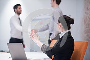 Young business woman on meeting using laptop computer