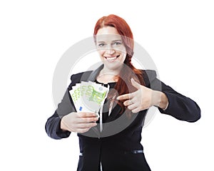Young business woman point to a lot of euro bank notes