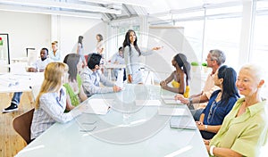 Young Business woman presenting in Office