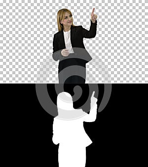 Young business woman presenting something pointing at virtual ob