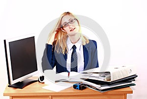 Young Business Woman Relaxing Behind Desk