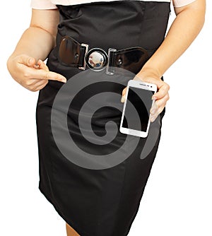 Young business woman showing with black display of mobile phone