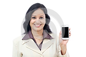 Young business woman showing with black display of mobile phone