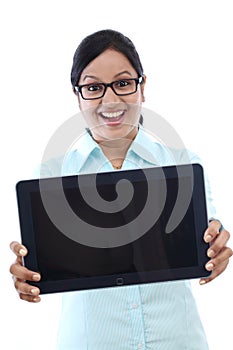Young business woman showing tablet