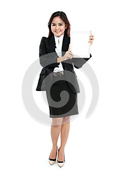 Young business woman showing tablet screen