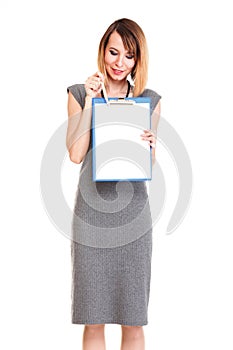 Young business woman standing with her clipboard isolated