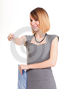 Young business woman standing with her clipboard isolated